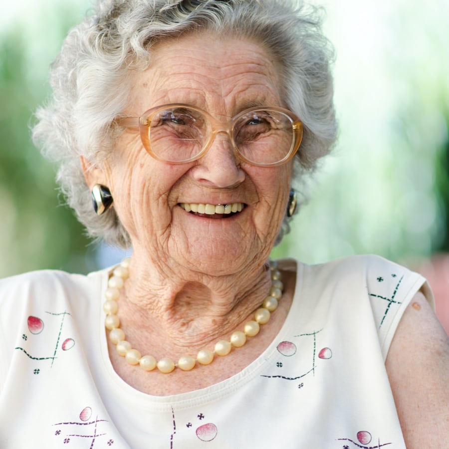 Mature woman dressed up smiling