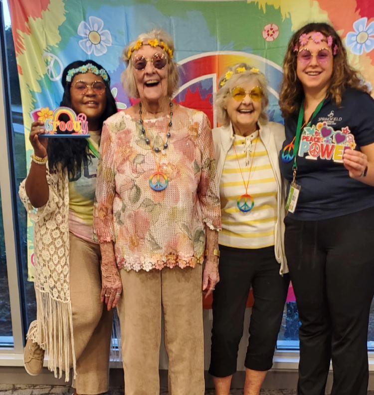 ​PHOTO ​​​CAPTION: Springfield Crossings residents and staff enjoying a ‘60s Groovy Game Night during their Assisted Living Week celebration. Pictured (L-R) are Hazel Robertson, Rita Pandoli, Mary Mitchell and Isabella Dieno.